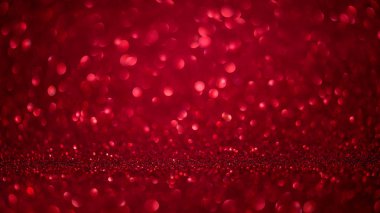 Kırmızı Bokeh şekli yuvarlak anneler günü Sevgililer günü, 8 Mart veya kadınlar günü için parlak parıltı ile koyu arka plan ışıklar. Stüdyo vurdu