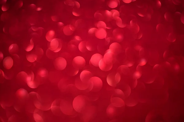 Rouge Bokeh forme ronde Journée des femmes Fond avec des paillettes lumineuses Lumières pour la Saint-Valentin, 8 mars ou la journée de l'amour. Plan studio — Photo