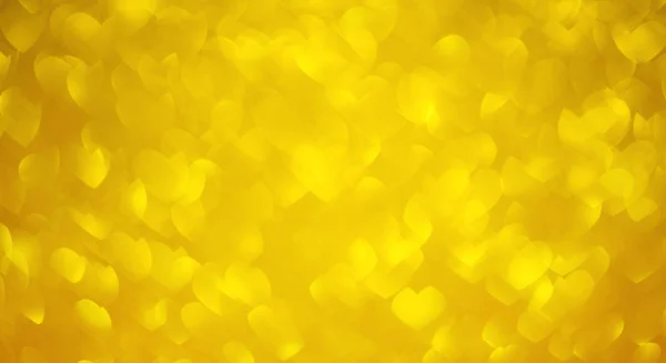 金色闪亮的节日美丽的背景与博克形状的心 — 图库照片