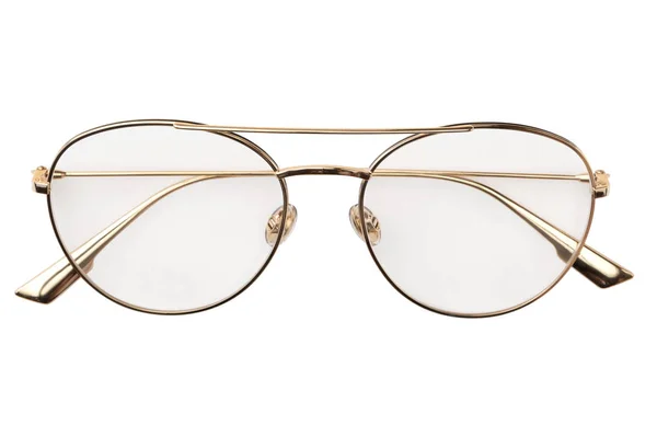 Lunettes dorées en métal dans un cadre rond transparent pour la lecture ou une bonne vision, vue de dessus isolée sur fond blanc. Modèle de lunettes — Photo