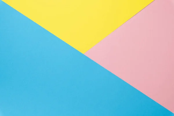 Puesta plana hecha de fondo de papel multicolor de diferentes colores. Vista superior — Foto de Stock