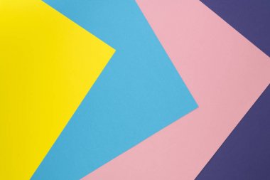 Pastel renkli kağıt dokusu. Düz yaratıcı geometrik arka plan yatıyordu. Düz yatıyordu