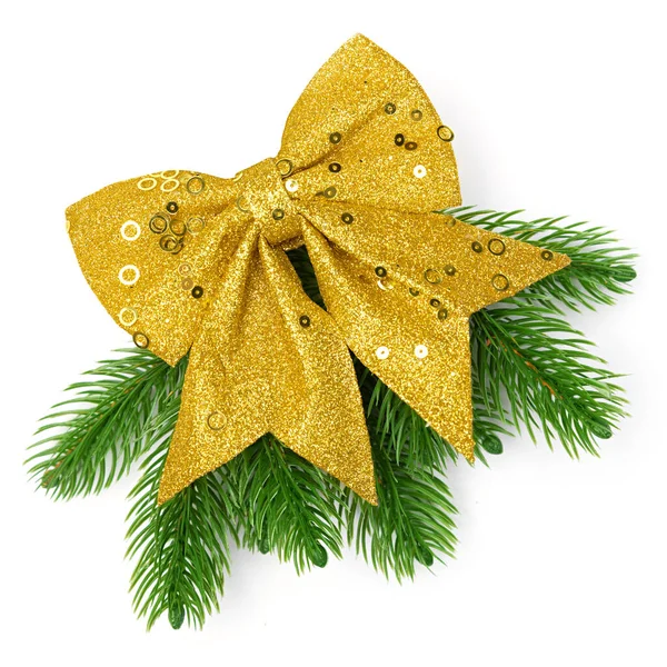 Christmas ornament gold bow and pine branch isolated on white background — Stock Photo, Image