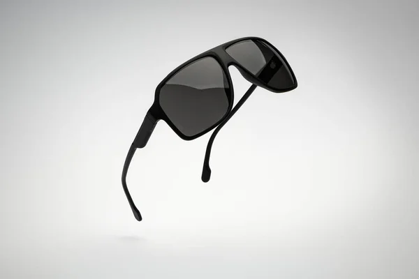Sluneční brýle létání na bílém a šedém pozadí. Sluneční brýle letní muž příslušenství jako designový prvek pro promo nebo reklamní banner — Stock fotografie