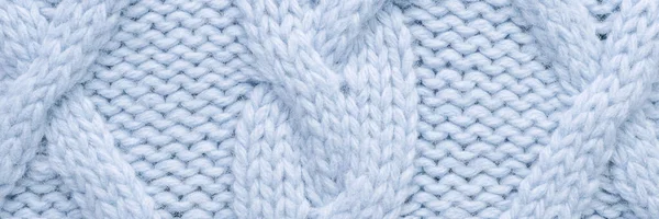 Pletené vlněné pozadí. Modrá textura pletený vlněný svetr — Stock fotografie