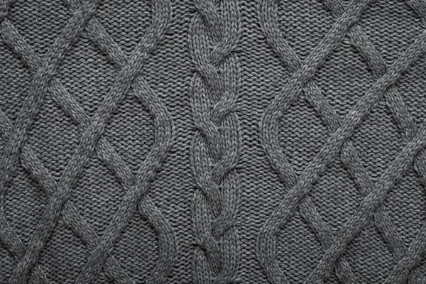 Kötött gyapjú háttér. Szürke textúra kötött gyapjú pulóver — Stock Fotó