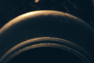 Metal round detail close-up. Imperfect surface.