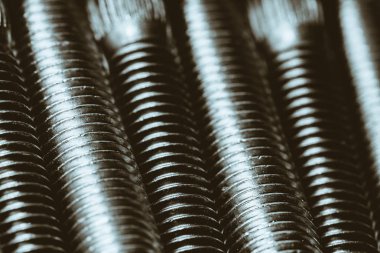 Otomotiv cıvatalarının tek renkli arkaplanı kapat.