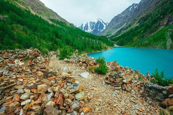 Pyramids Balancing Stones Stony Hill Background Glacier Mountain Lake Rich — Stock Photo, Image