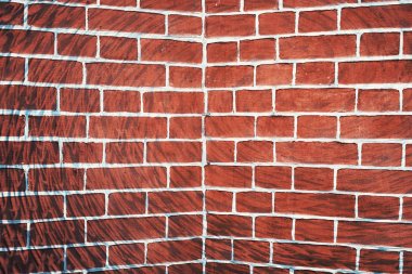 Halüsinojen gerçeküstü grafiti ile olağandışı kahverengi tuğla duvar. Pürüzsüz duvarın simetrik açısı. Uyuşturucu ve alkolden gelen perili hayal gücü. Geometrik arka plan.