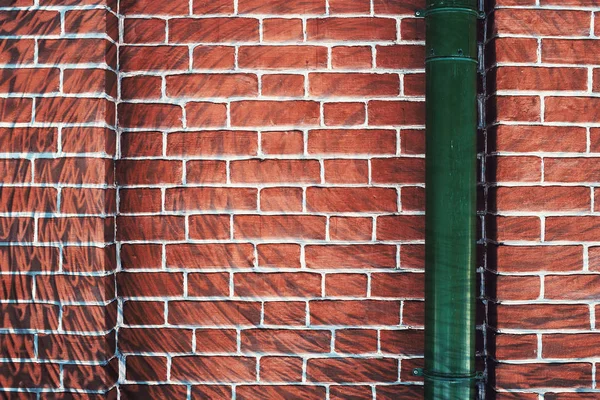 Unusual Uneven Brown Brick Wall Hallucinogen Surreal Graffiti Green Downspout — Stock Photo, Image