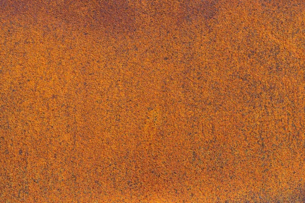 Rust on metallic surface. Rusted iron texture. Rusty metal background with copy space. Rough oxide plate close up. Strong rust. Hard decay of metal in macro. Oxidation of steel. Chemical reaction.