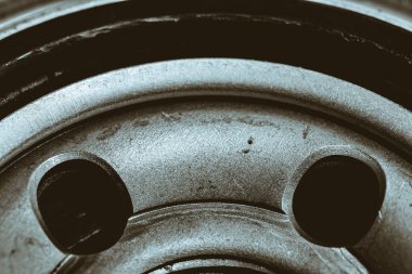 Yağ filtresinin tek renkli arkaplan görüntüsü. Makro fotoğrafçılıktaki otomatik bölümden sanat çalışmaları.