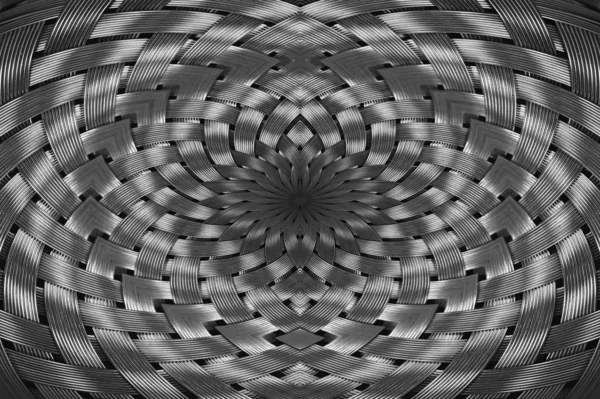 対称的なシルバーメタリックウィッカーテクスチャクローズアップ ボリュームスチールサーフェスの詳細背景 マクロで抽象的な灰色の編組ワイヤー コピースペースを持つシュールな形状 珍しい黒と白のスペース — ストック写真