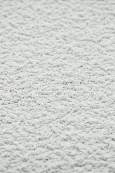 Snowy solid texture. Background detailed snow image on a flat surface.