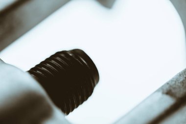 Monochrome background artwork from auto part close up. Macro photography.