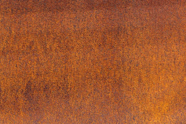 Rust on metallic surface. Rusted iron texture. Rusty metal background with copy space. Rough oxide plate close up. Strong rust. Hard decay of metal in macro. Oxidation of steel. Chemical reaction.