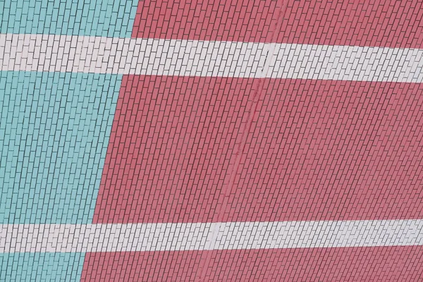白い線が付いているピンクとターコイズレンガの壁 壁近代的な建物クローズアップの背景 — ストック写真