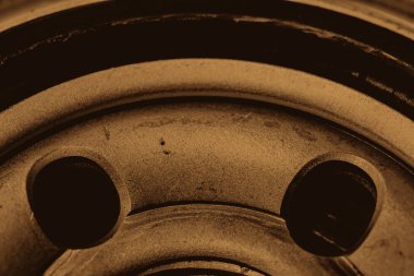 Yağ filtresinin tek renkli arka plan görüntüsü kapatın. Sepya tonlarında makro fotoğrafçılıkta otomatik bölümden sanat.