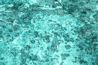 Klasik gök mavisi. Kaba boyalı turkuaz renkli duvar. Siyahların kusurlu düzlemi. Süslenmemiş eski dekoratif arkaplan rengi. Deniz mavisi rengi deseni. Süslü taş yüzeyi.