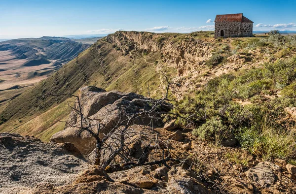 Agstafa rayon of Azerbaijan, close of border between Georgia and Azerbaijan.David Gareja is a rock-hewn Georgian Orthodox monastery complex located in the Kakheti region of Eastern Georgia, on the half-desert slopes of Mount Gareja, southeast of Geor