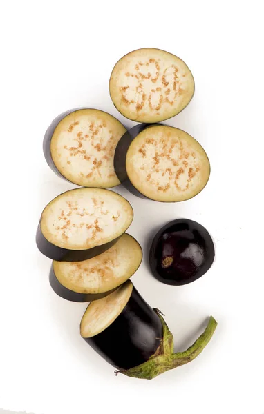 Eggplant or aubergine and parsley leaf on white — Stock Photo, Image