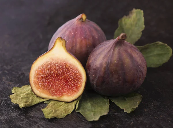 Fresh figs on black background close up — Stock Photo, Image