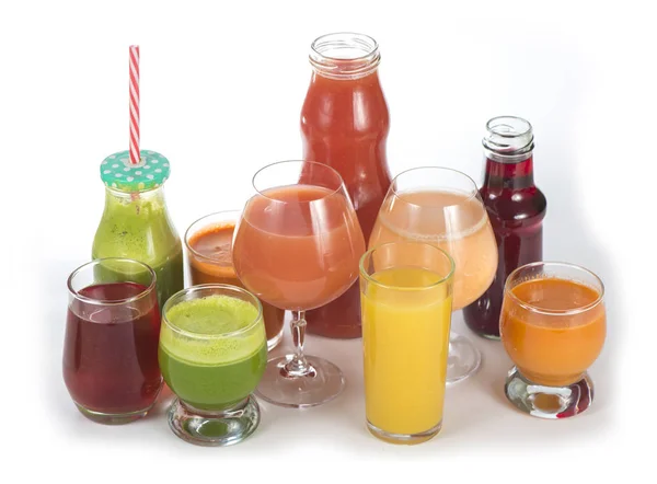 Glasses with various fresh vegetable juices on white — Stock Photo, Image