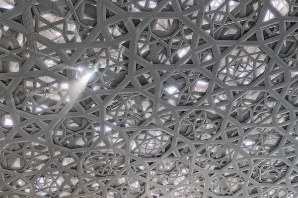 Abstract ceiling with light entrances.