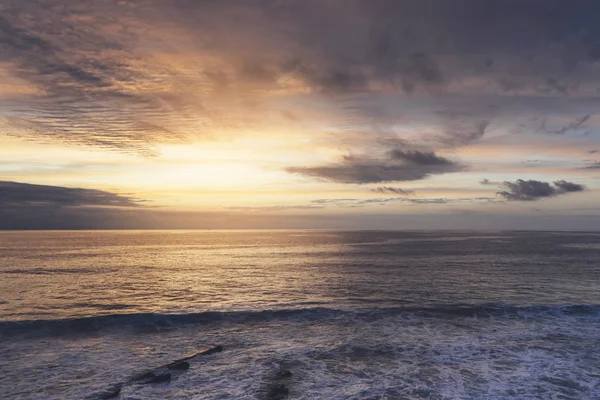 Sunlight sunset on horizon ocean on background seascape atmosphere rays sunrise. Relax view waves sea on evening sand beach, sun light flare nature evening outdoor vacation concept, copy space for text