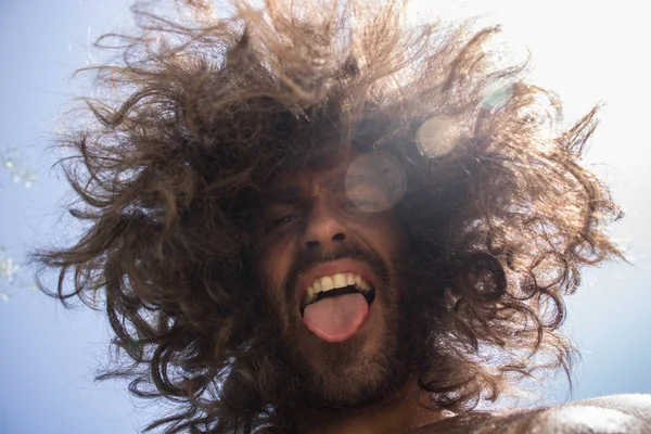 Low Angle View Man Lush Hairstyle Showing Tongue — Stock Photo, Image