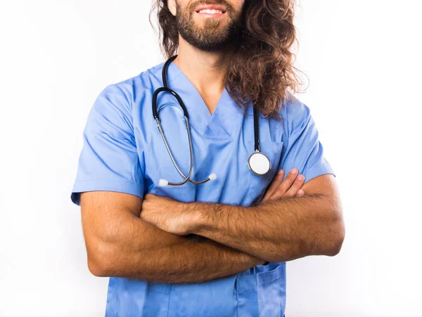 Hombre Que Lleva Uniforme Médico Azul Con Estetoscopio Imagen De Stock