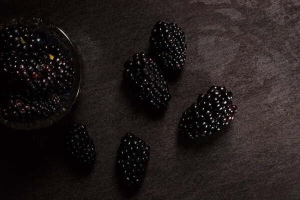fresh blackberries in a glass bowl