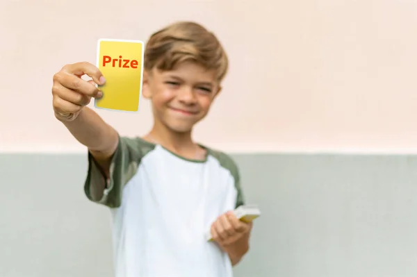 Little Boy Holds His Hands Card Paper Game — Stock Photo, Image