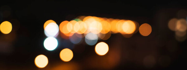 Blurry image of night lights on the street