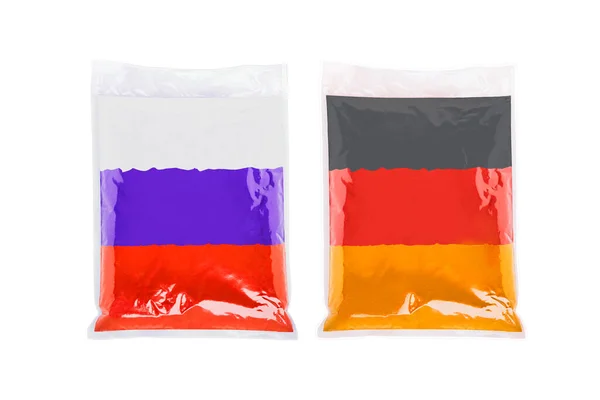 Transparent plastic packaging bag with small bulk goods. Image of the Russian and German flags