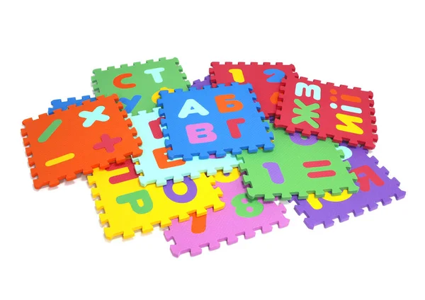Puzzel mat - veelkleurige zachte elementen letters en cijfers op een witte achtergrond — Stockfoto