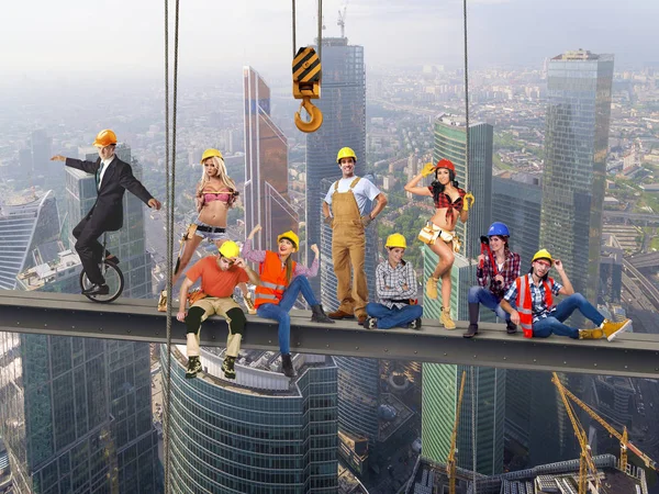high-rise workers on the beam