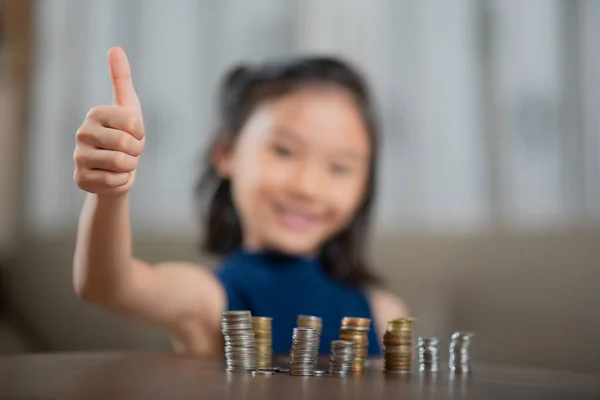 Asian girl, managing finances, counting money