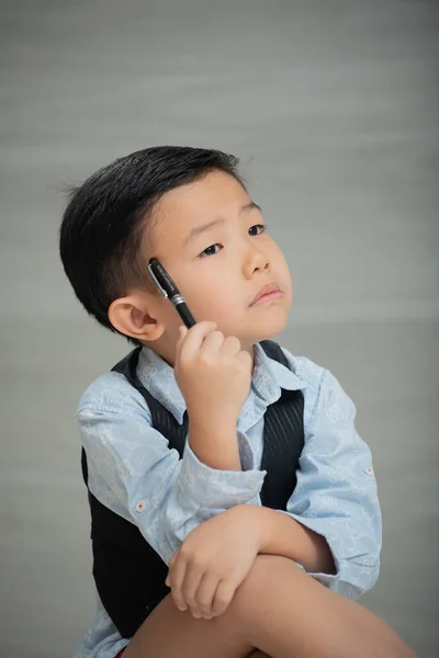 Asian Boy Dressed Smartly Stock Image