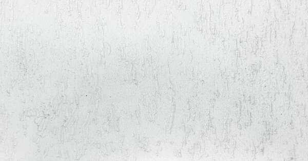 Grungy painted wall texture as background. Cracked concrete vintage wall background, old white painted wall texture. Background washed painting