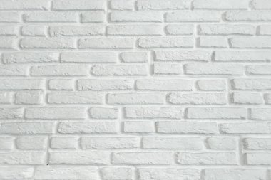 Soyut yıpranmış doku eski sıva açık gri lekeli ve boya beyaz tuğla duvar arka planda kırsal Oda, beyaz renk yatay mimari duvar kağıdı yaşlı. Kesintisiz beyaz grunge tuğla duvar