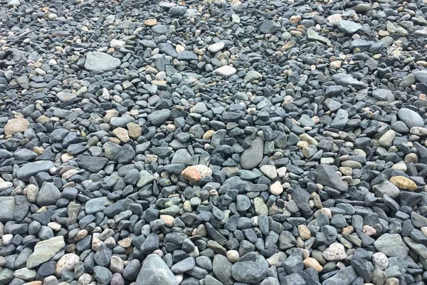Stone pebbles texture background for interior exterior decoration and industrial construction concept design. Colourful pebble texture.