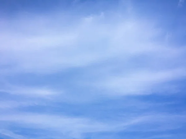 Beautiful clouds against a blue sky background. Cloud sky. Blue sky with cloudy weather, nature cloud. White clouds, blue sky and sun.