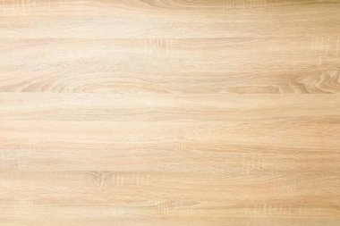 Arka plan olarak hafif kahverengi yumuşak ahşap doku yüzey. Ahşap plakalar tablo desen üstten görünüm yıkanmış grunge