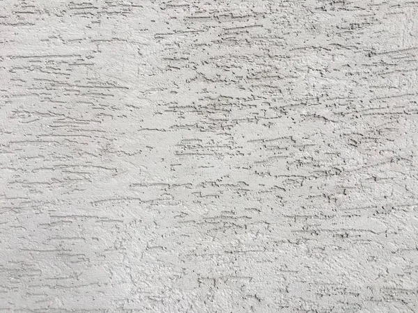 Textura branca da parede do estuque. Efeito de gesso decorativo no fundo da parede . — Fotografia de Stock