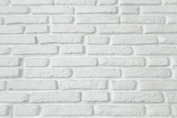 白グランジ レンガの壁のテクスチャ背景、白いペンキで描かれたレンガの壁します。 — ストック写真