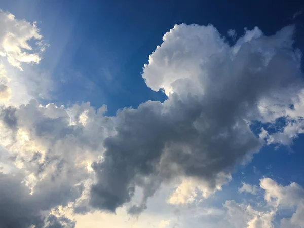 Beautiful blue sky with clouds background. Sky clouds. Sky with clouds weather nature cloud blue. Blue sky with clouds and sun.