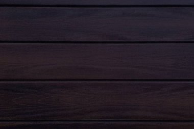 Siyah ahşap doku arka plan ağaç doku gösterilen soluk Vernik boya ile yıpranmış sıkıntılı yıkanmış ahşap koyu meşe. Ahşap plakalar desen tablosu üstten görünüm yıkama