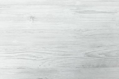 ahşap doku arka plan yıkanmış, hafif yumuşak meşe ağaç doku gösterilen soluk Vernik boya ile sıkıntılı yıkama ahşap yıpranmış. Beyaz ahşap plakalar tablo üstten görünüm desen